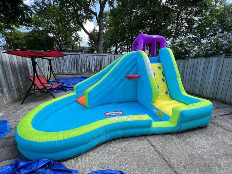 Slam N' Curve slide set up in a backyard