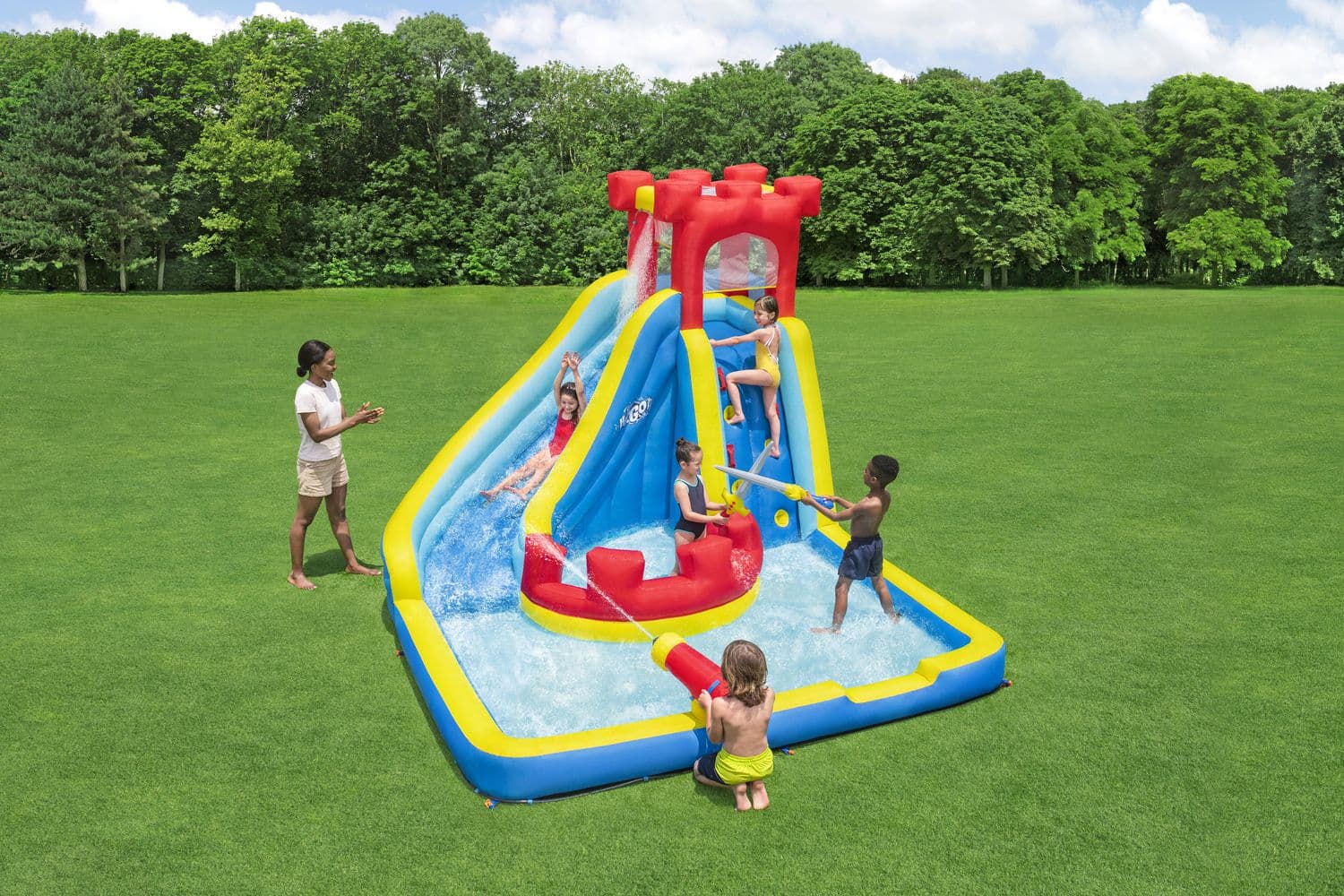 Royal Splash castle water slide with a splash pool on a lawn